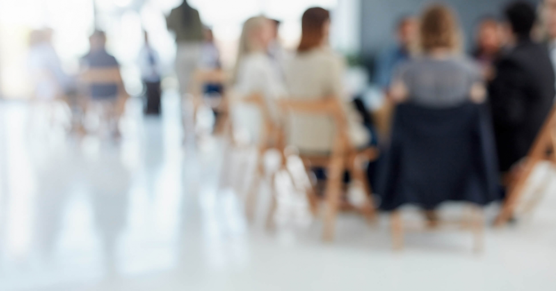 A group of people sitting in chairs