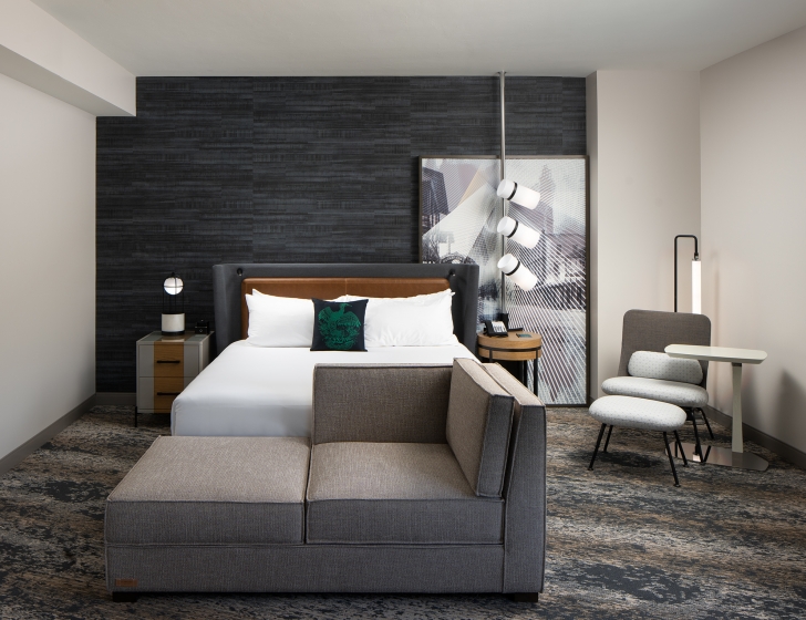 A room with a bed and a couch