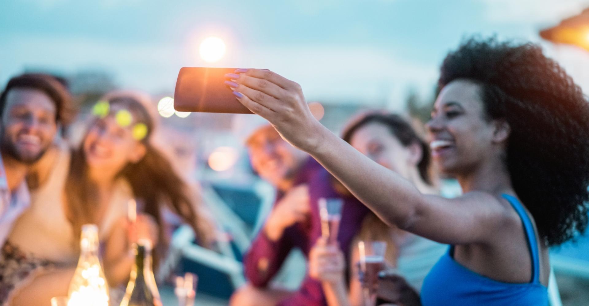 A group of people taking a selfie