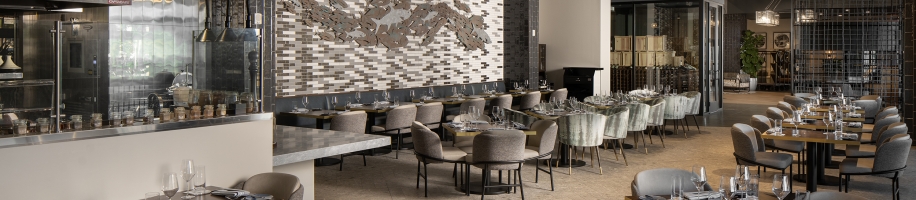 A restaurant with tables and chairs