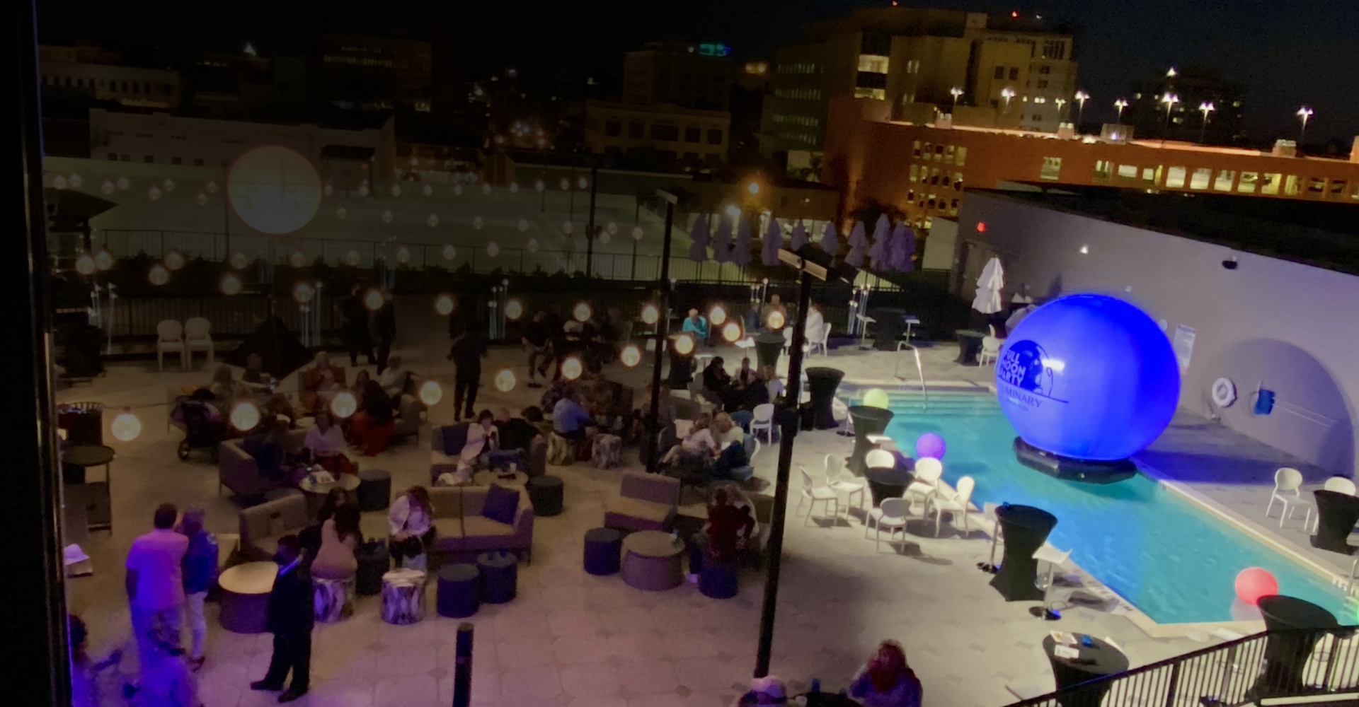 A pool with a large blue sphere in the middle